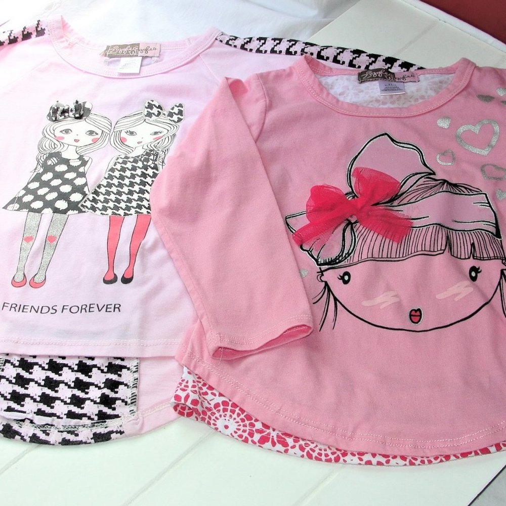 3 for $18.. 2 Ziggles Wiggles Tops EUC